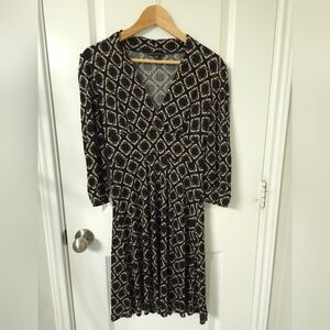 Elegant Black and Cream Patterned Dress